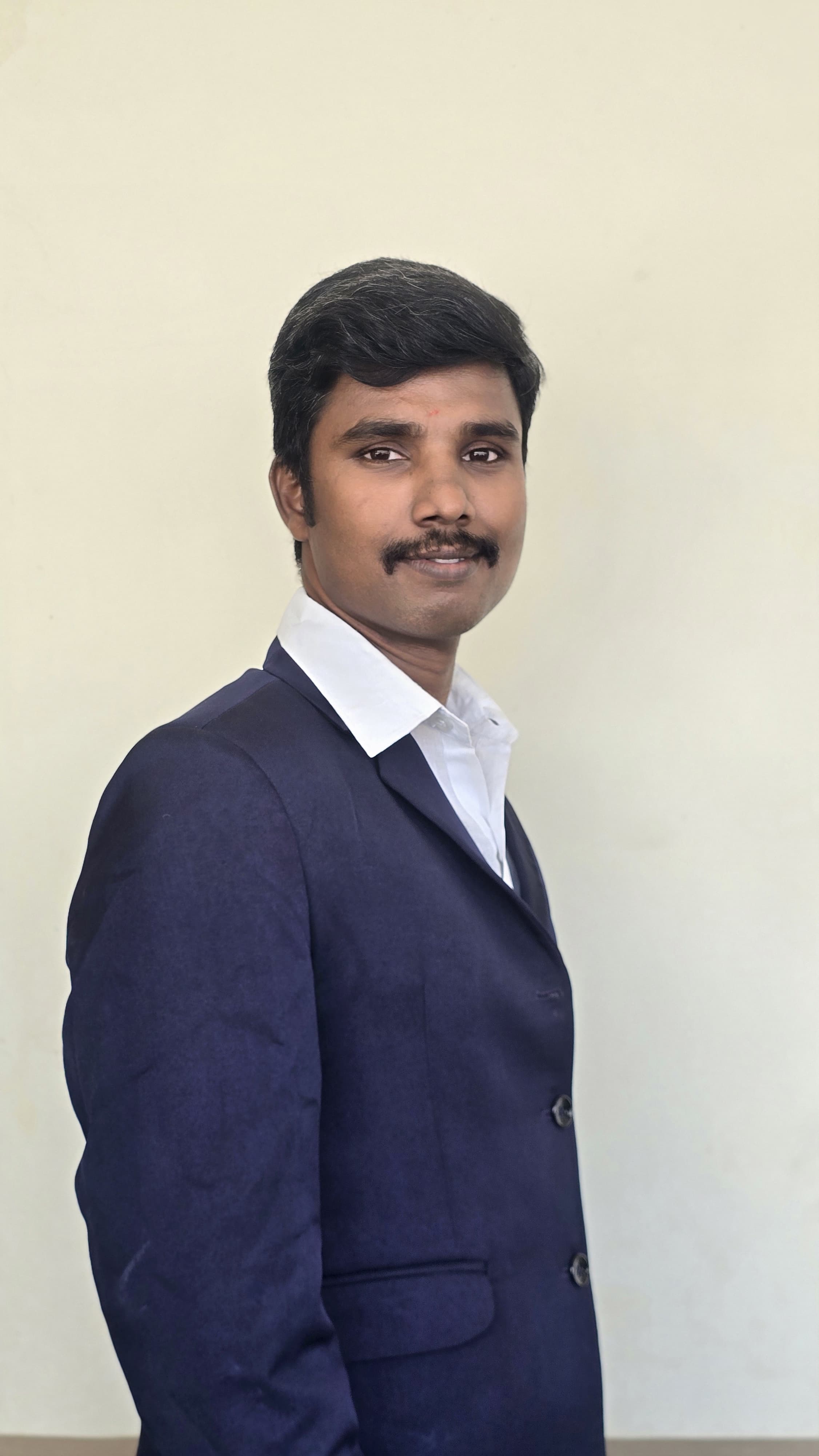 Mr.RAJA M