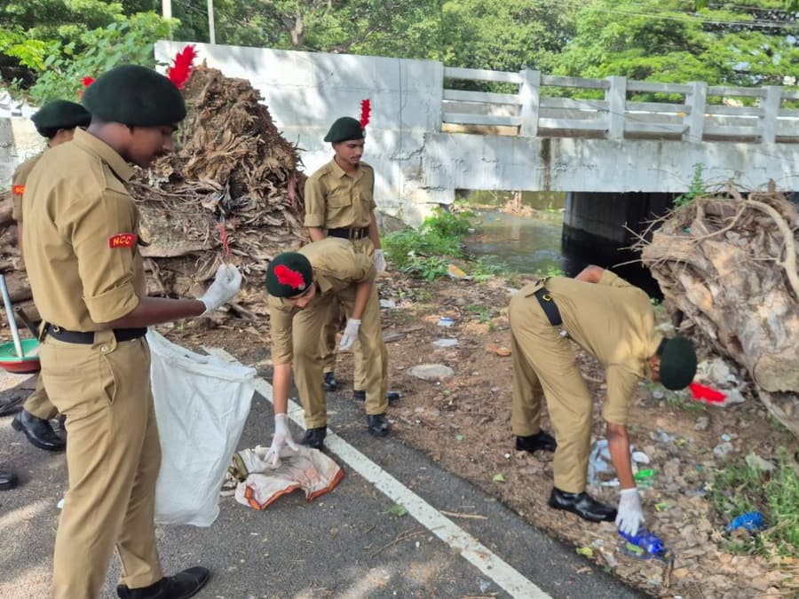 Cadets clearing waste at the Pullampadi canal